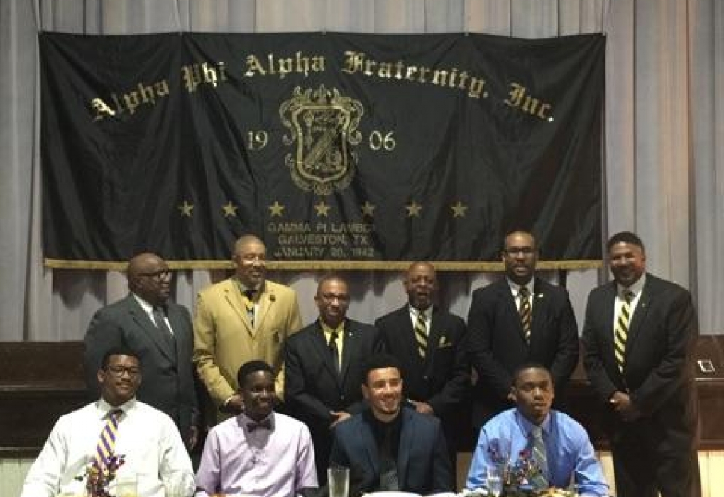 Scholarship recipients backed by guest Alpha Brothers