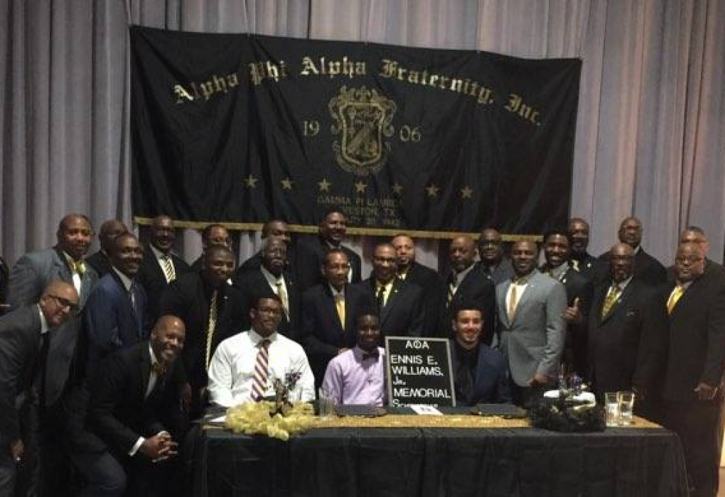 Scholarship recipients flanked by all the Brothers